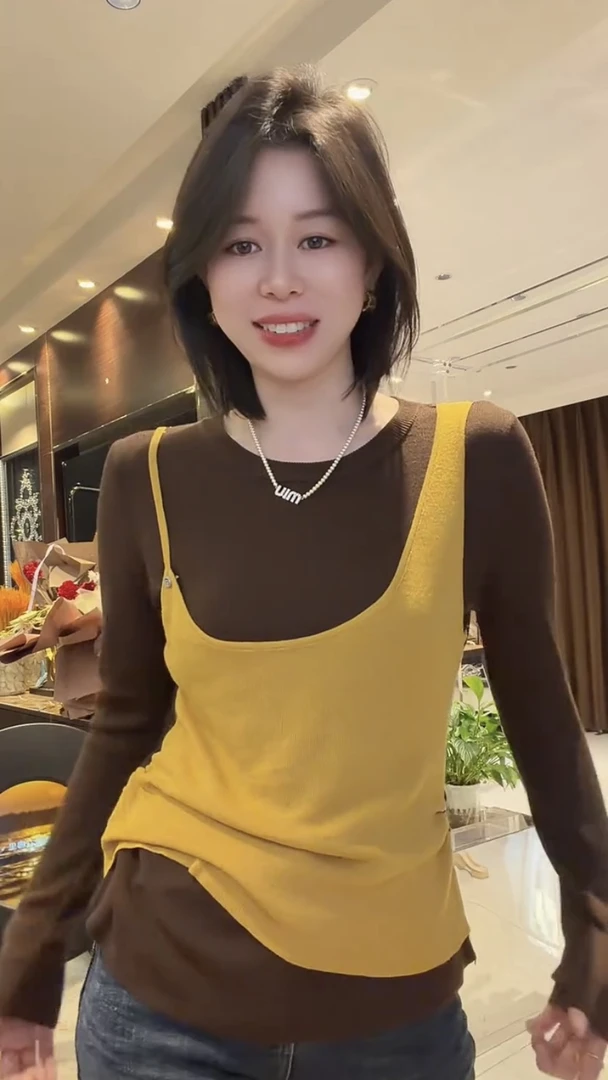 欧货新款时尚不规则背心拼接圆领长袖假两件打底衫女设计感针织衫