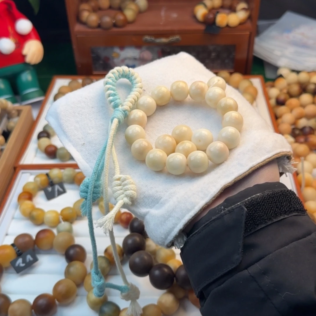菩提根/象牙果手串阿*.卡16苹果全品加流苏
