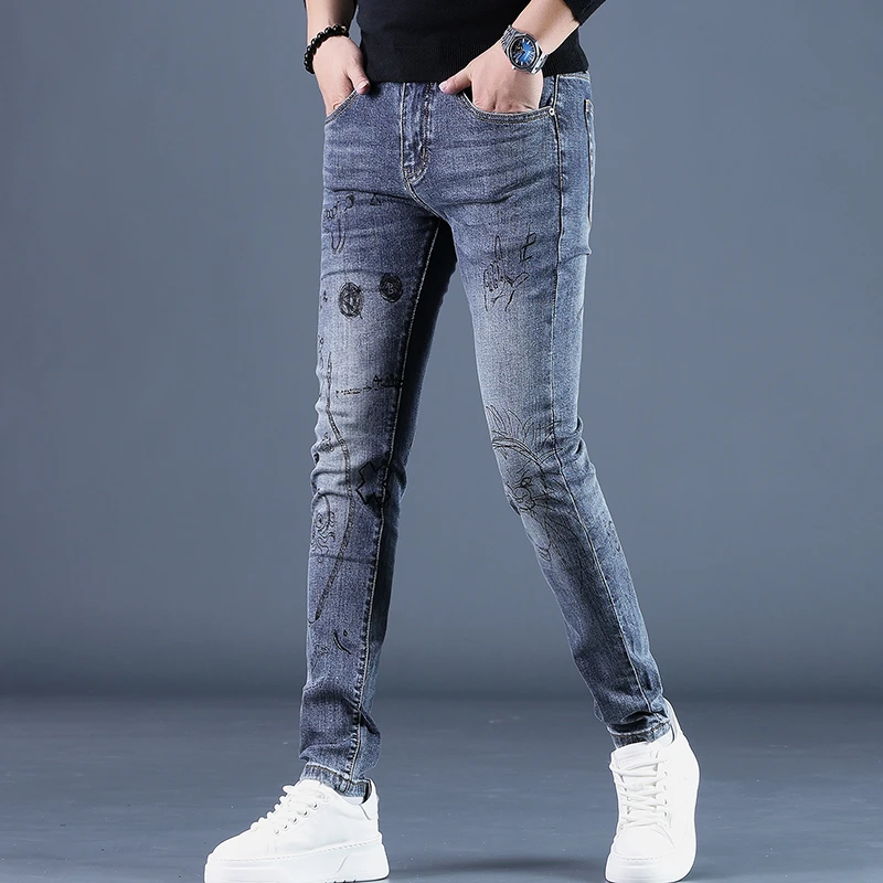 MR.25男士高端牛仔裤秋季新款弹力印花修身小脚长裤潮牌牛仔男裤