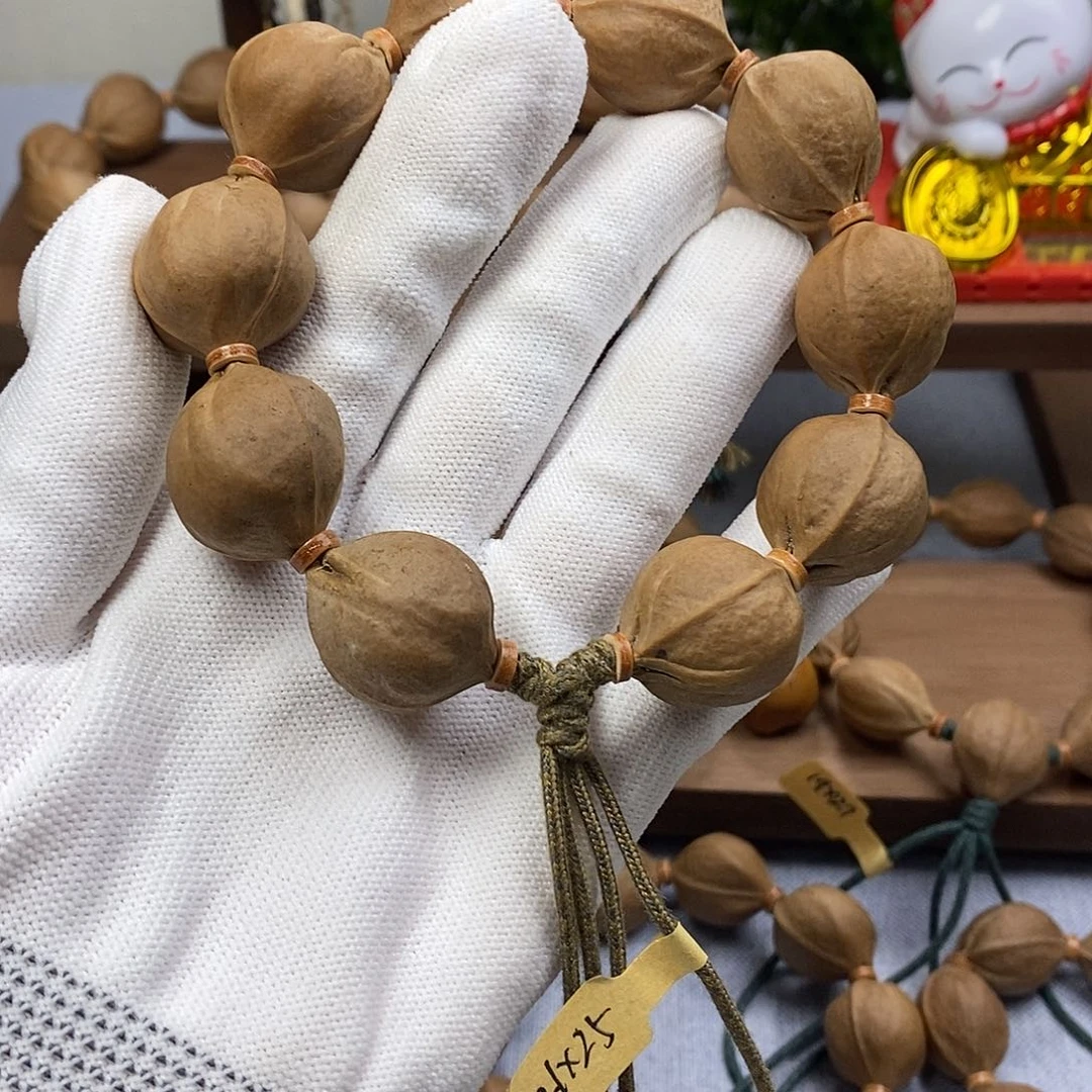 Q***.手串橄榄核梅林铁核2125