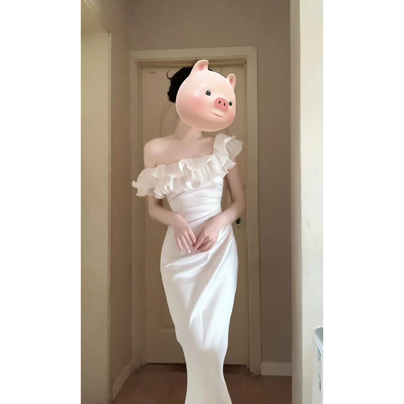 一字肩性感白色连衣裙女夏季2025新款法式性感气质收腰高级感长裙