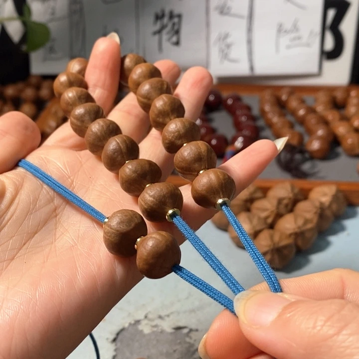 橄榄核手串14*13精品小蒜头铁核16+2颗
