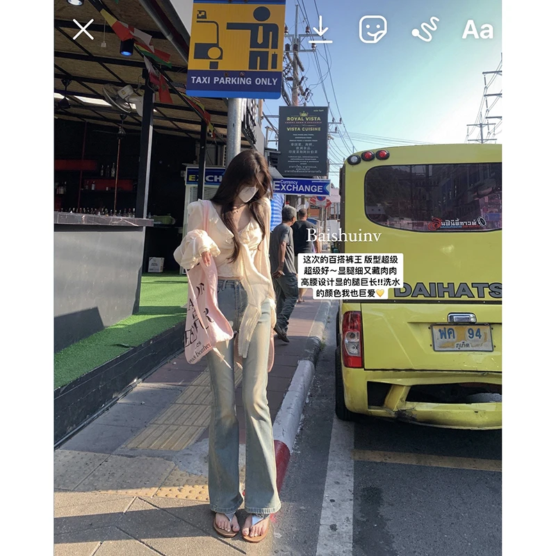 白水女 复古辣妹~高腰显瘦微喇牛仔裤女蓝色牛仔长裤子 B30310120