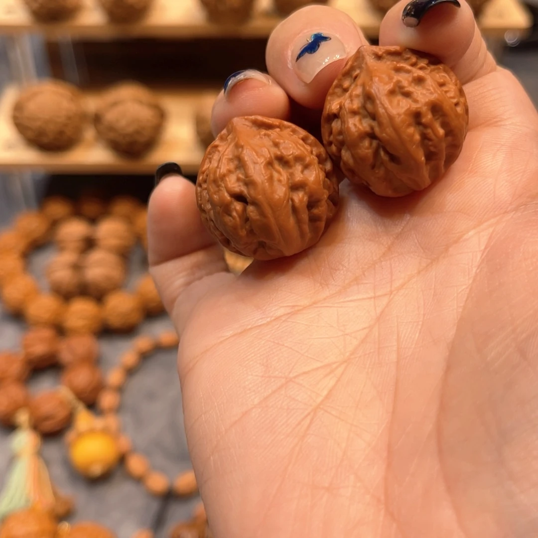 桃核把件双龙球手捻