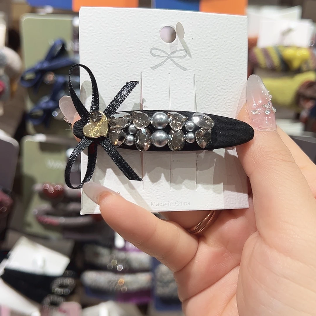 羽毛不锈钢爆米花蝴蝶结鸭夹