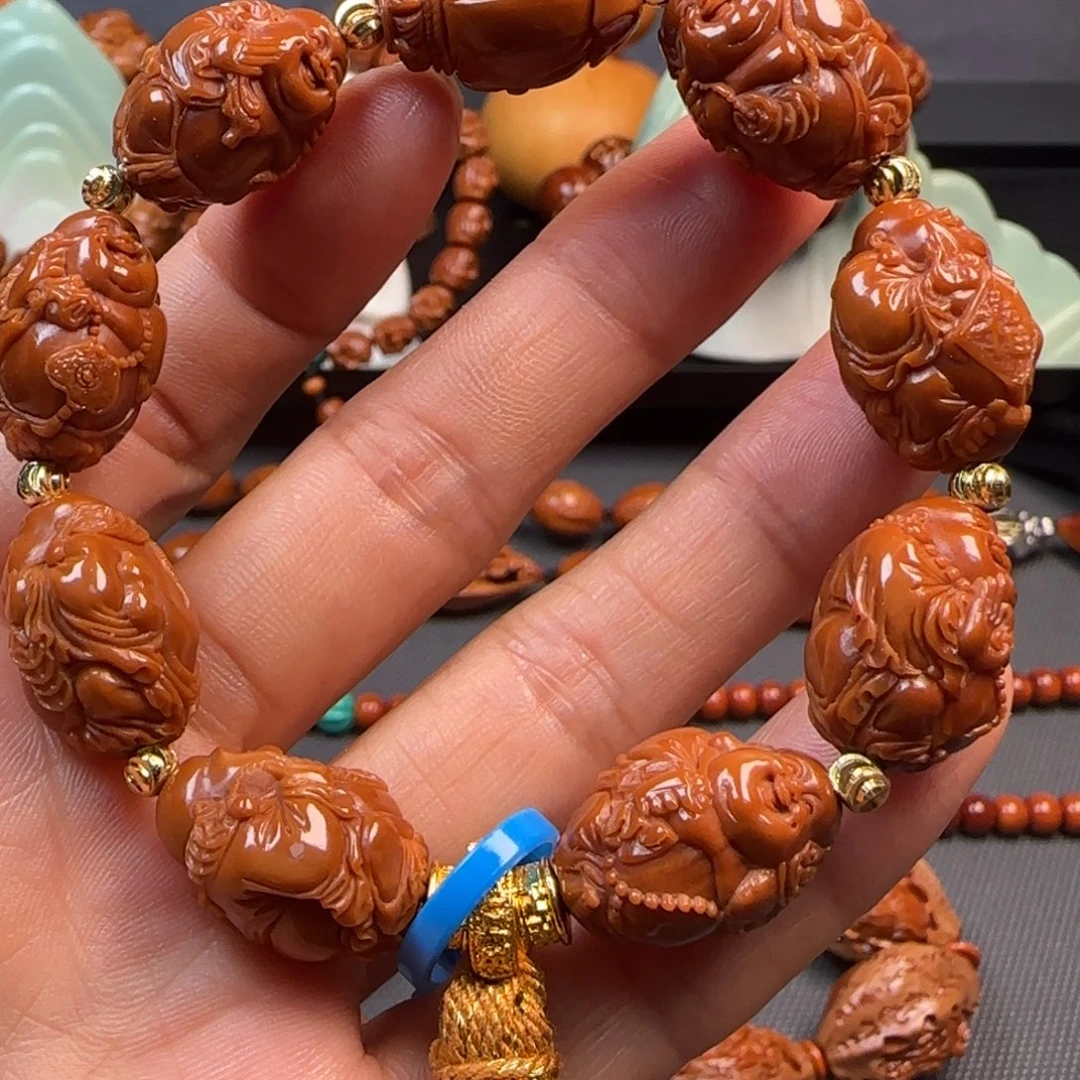 橄榄核手串水晶核八宝弥勒