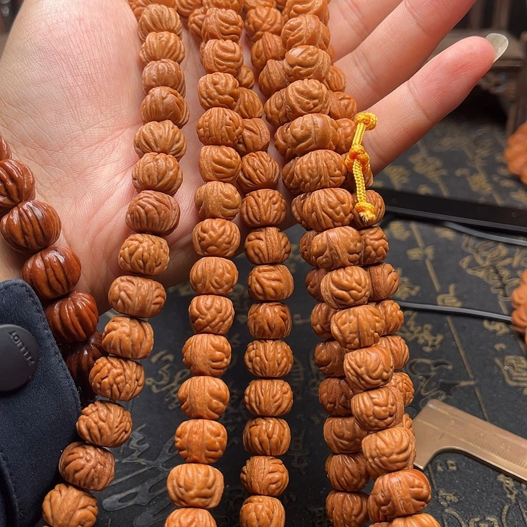 桃核吊坠赤金风雨薄挂