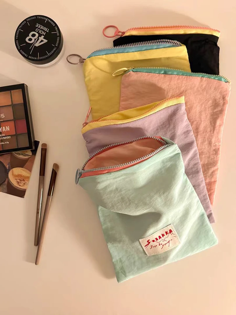 【收纳小包】小众设计轻奢化妆包小物件收纳袋外出手拿包轻便百搭女