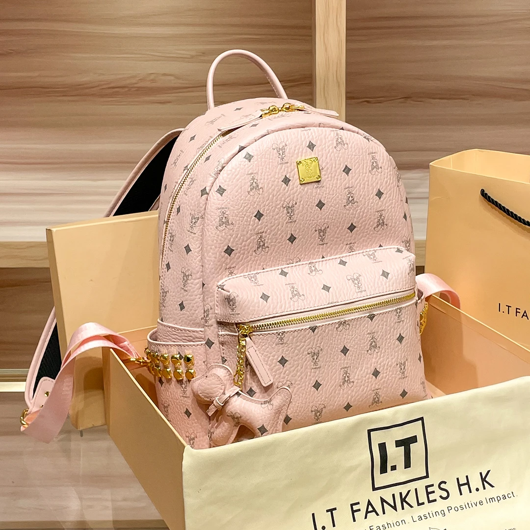 菲尼兔双肩包女爆款2025新款大容量男女同款铆钉软皮休闲旅行背包