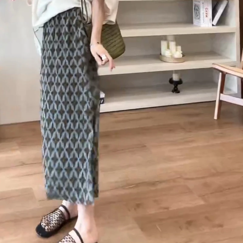 【星星裙】夏季新款复古花纹松紧腰下摆开叉半身裙LK2504078