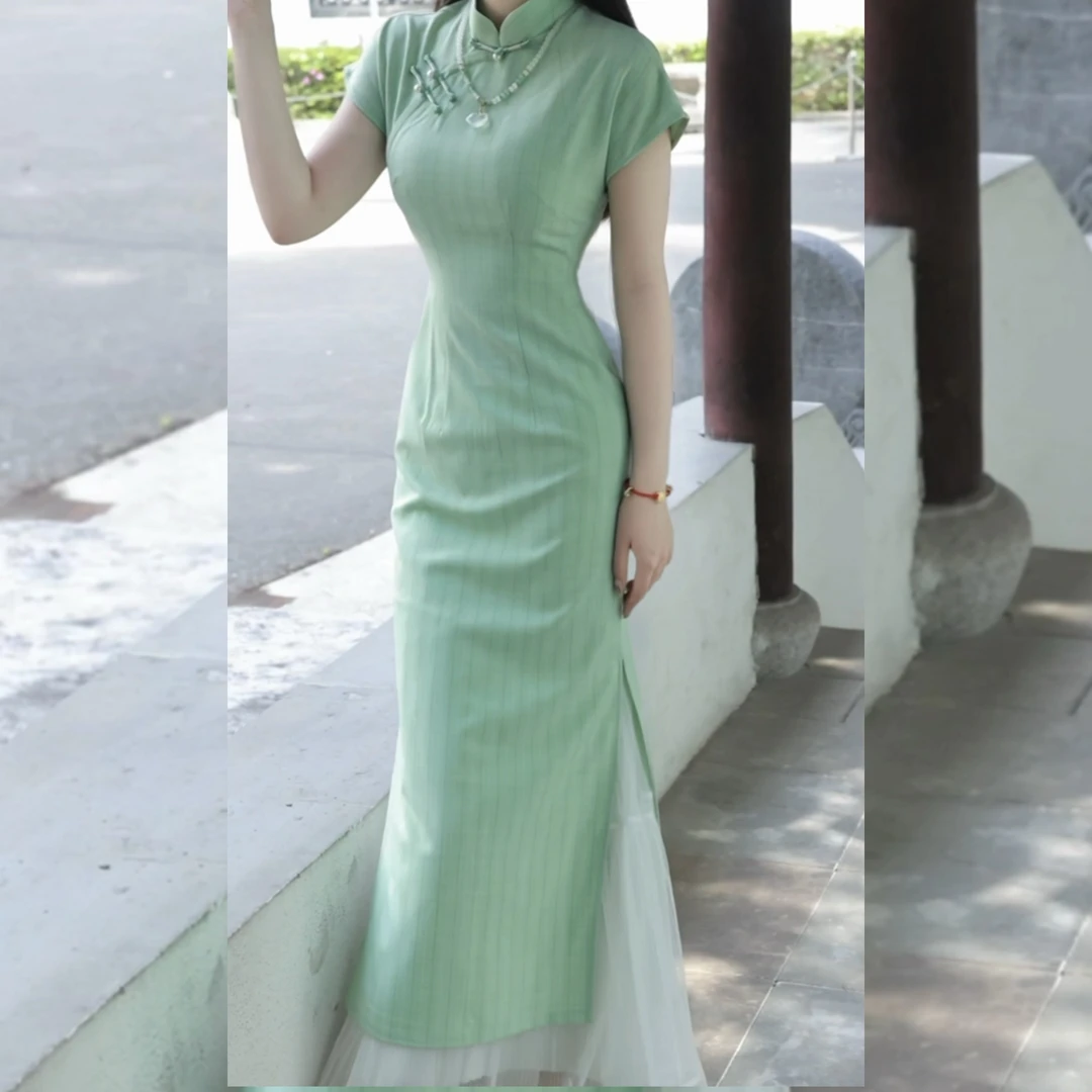 俏娘鱼2025年春夏新款素雅改良蓝色新中式复古短袖旗袍女日常可穿