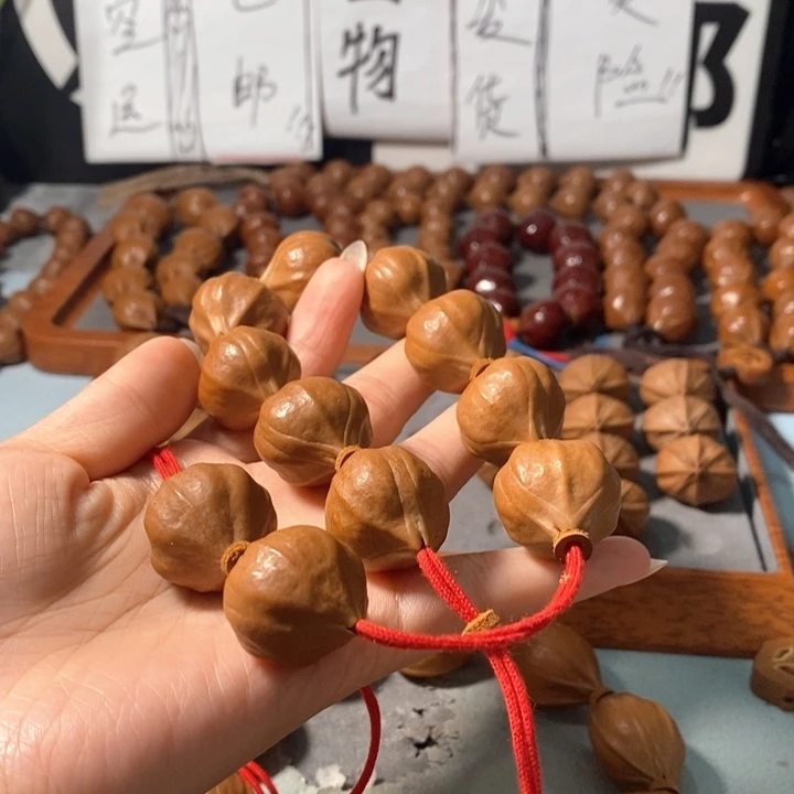 四***惑手串橄榄核5222精品老树王百万水晶核9+2颗