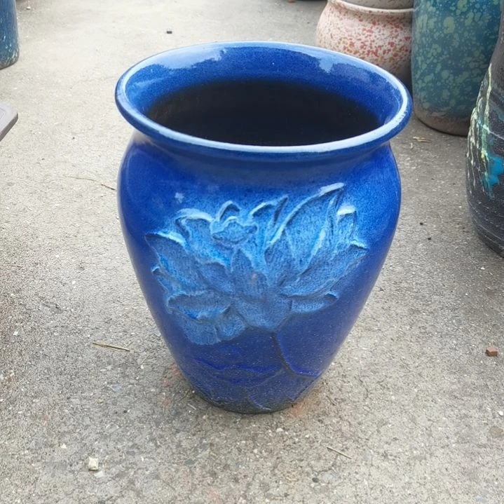 红陶口20高27瑕疵底部烧裂