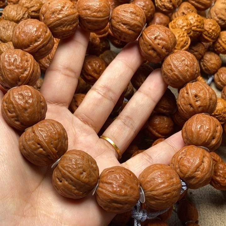 文玩核桃吊坠光头手持