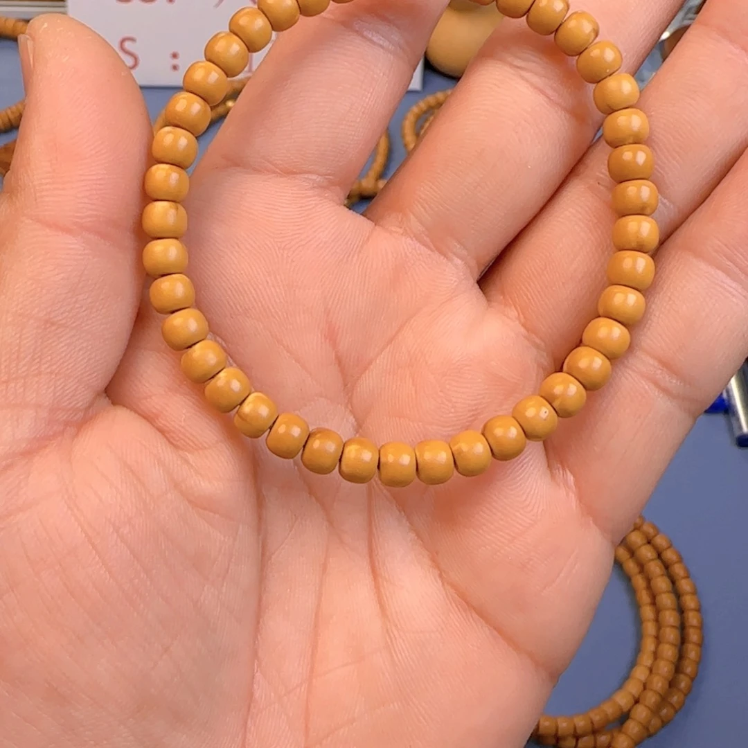 橄榄核手串羽*翟核尖老型尺寸5.7特价