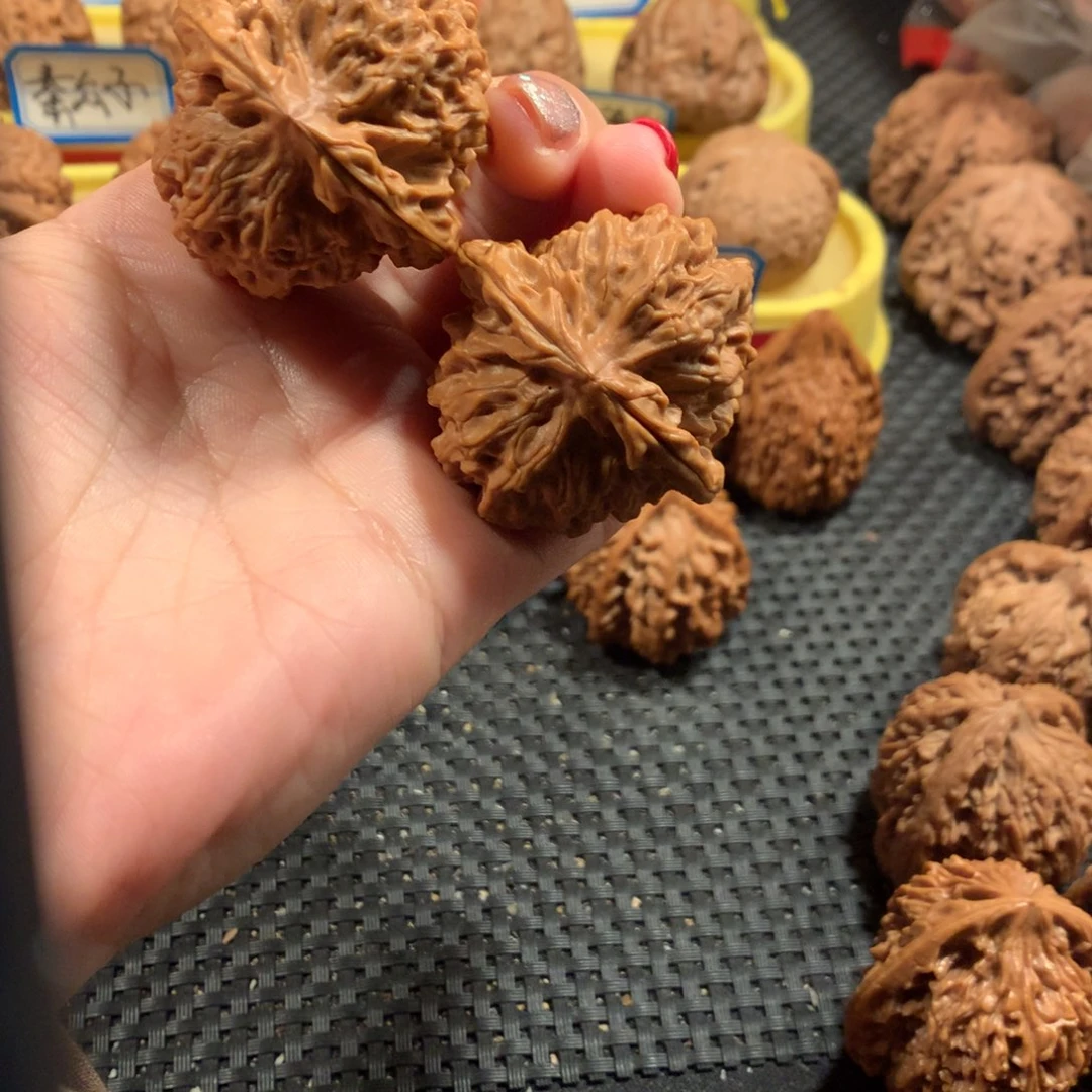 文玩核桃把件雪花元宝