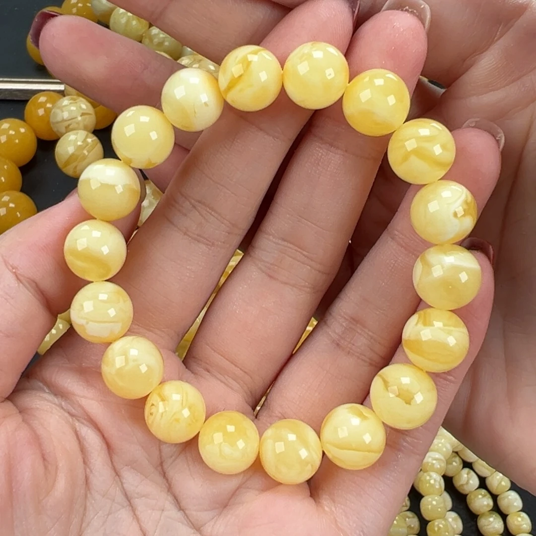 琥珀未镶嵌手链14.1黄白妖花