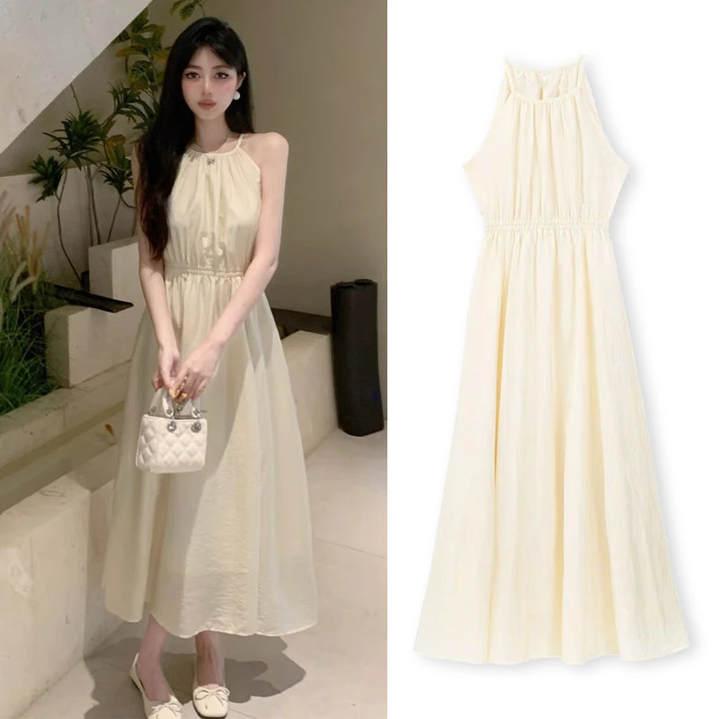 海边度假杏白吊带连衣裙子女夏季2025新款韩系氛围感气质穿搭长裙