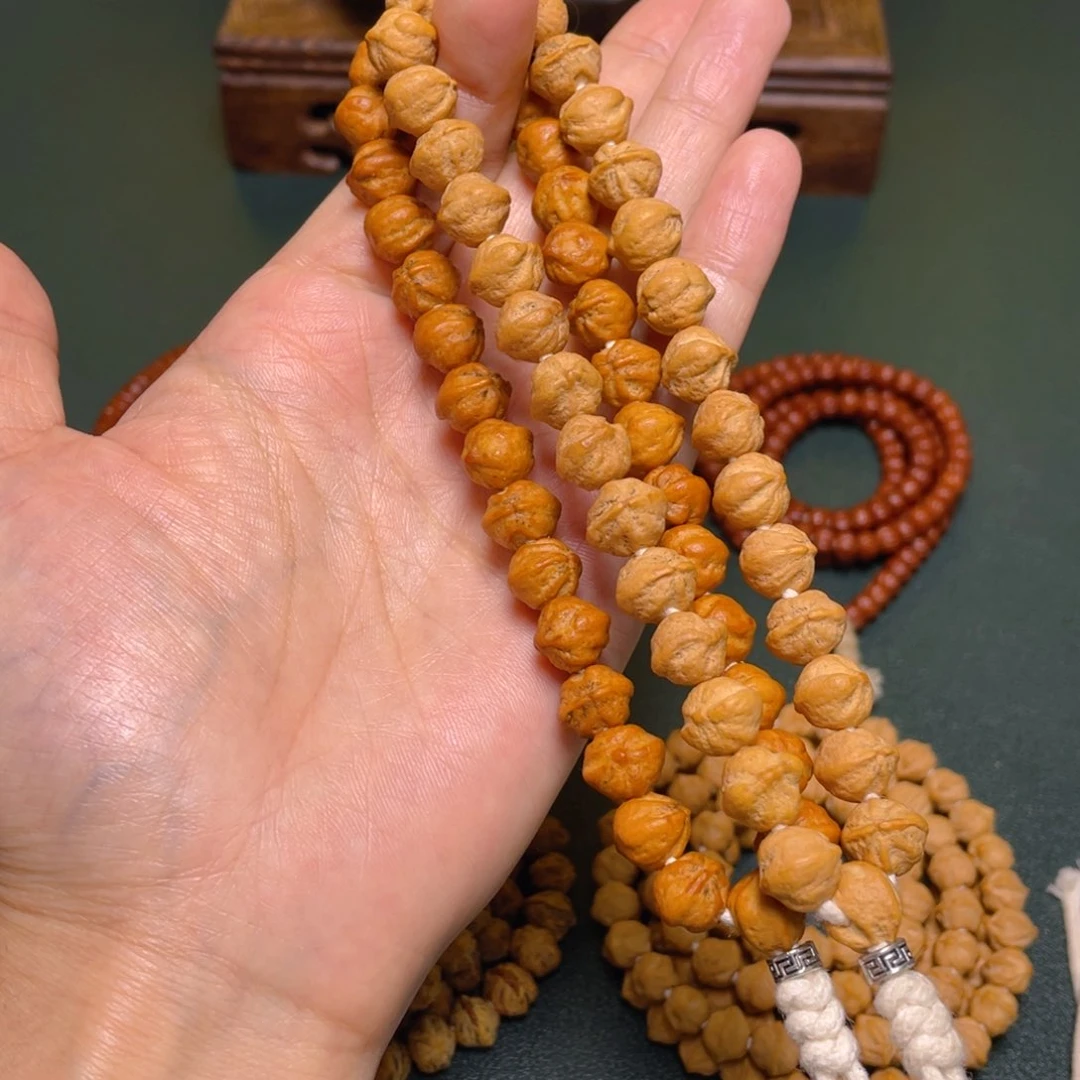 柏香籽/百香籽吊坠福利白牙手持