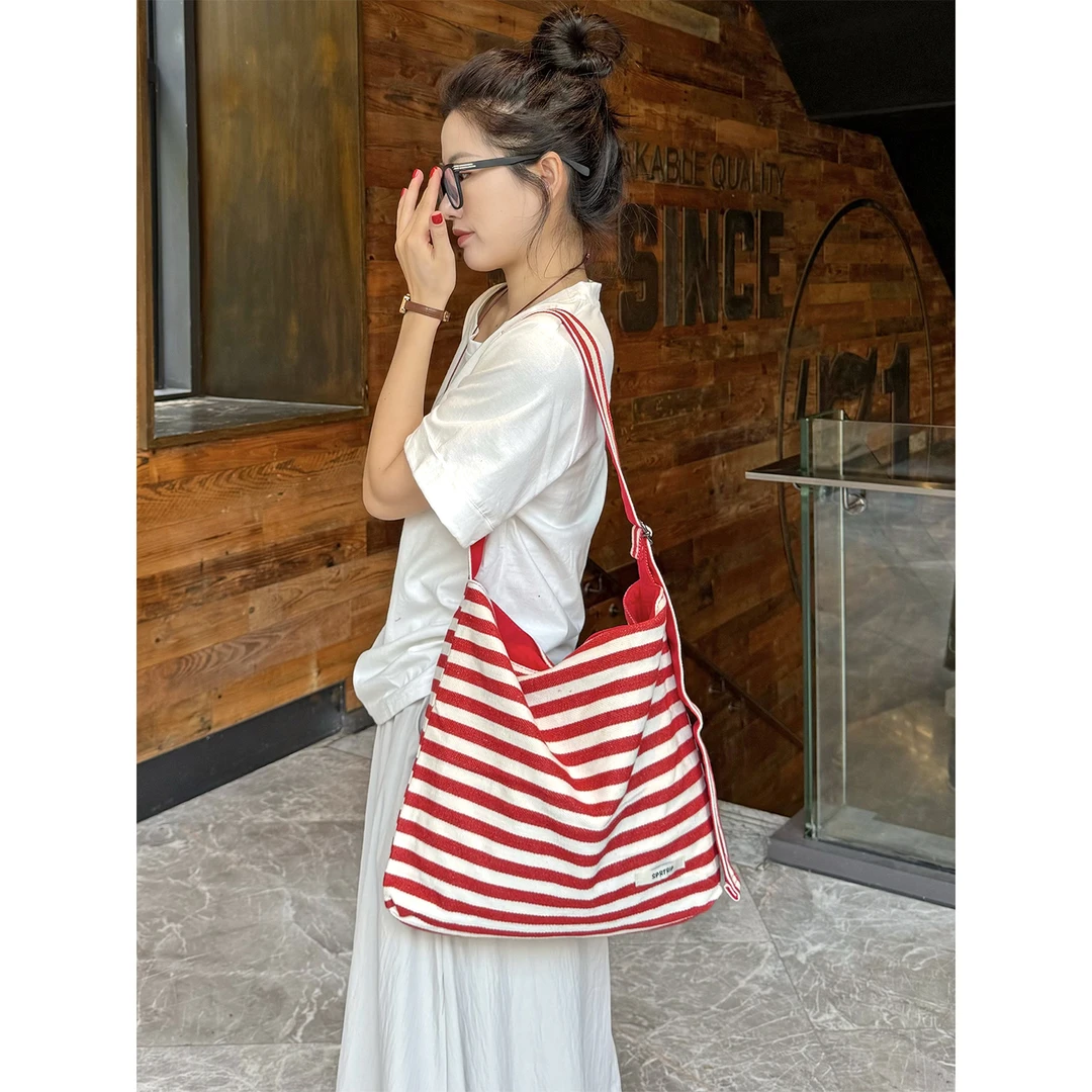 BYZZ新款条纹帆布包女休闲轻便单肩包夏日百搭托特包水桶包斜挎包