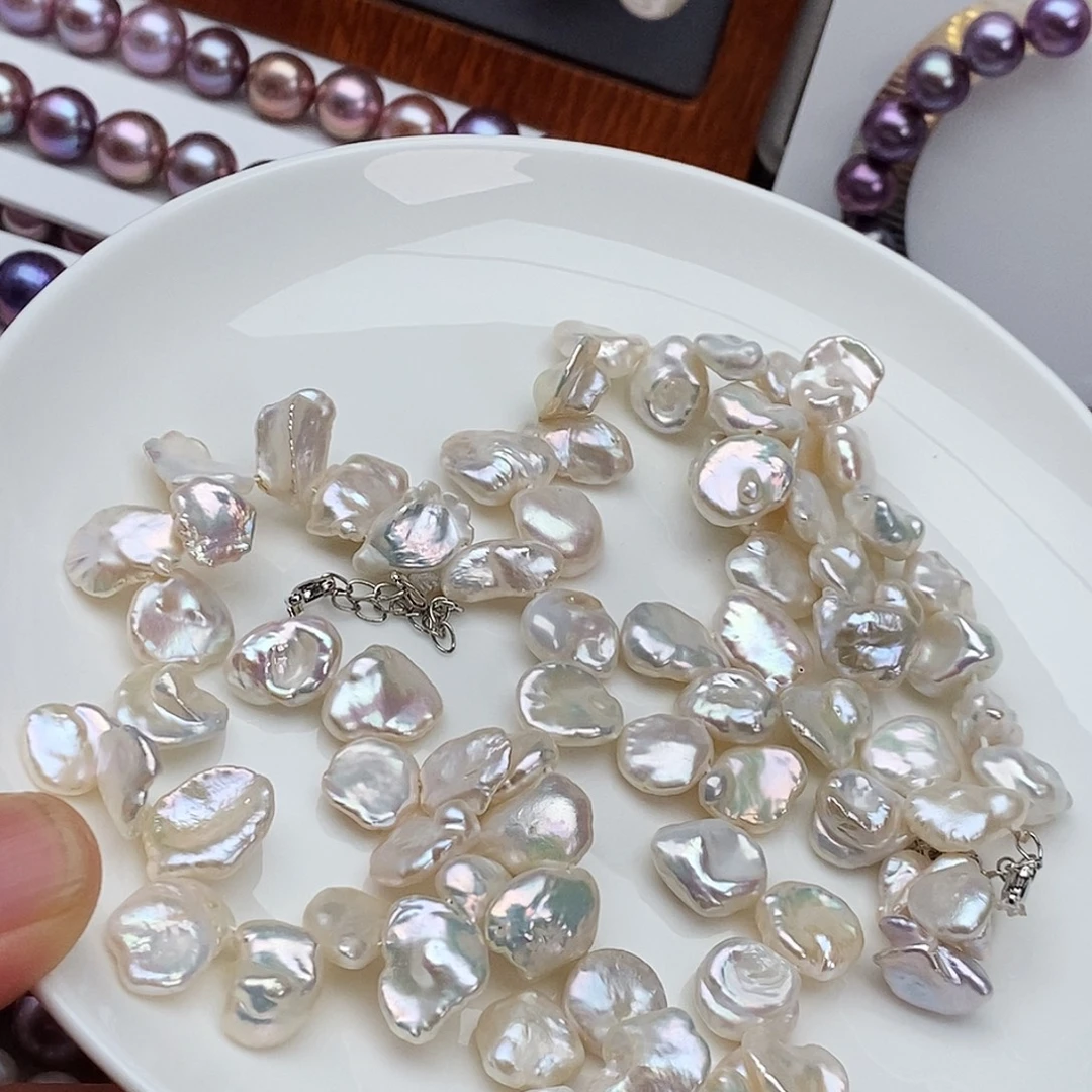 淡水珍珠银S925镶嵌耳饰