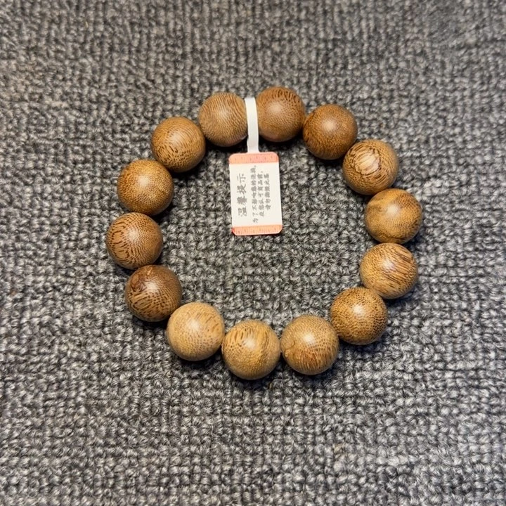 彩****木海南黄油格老料1.6手串