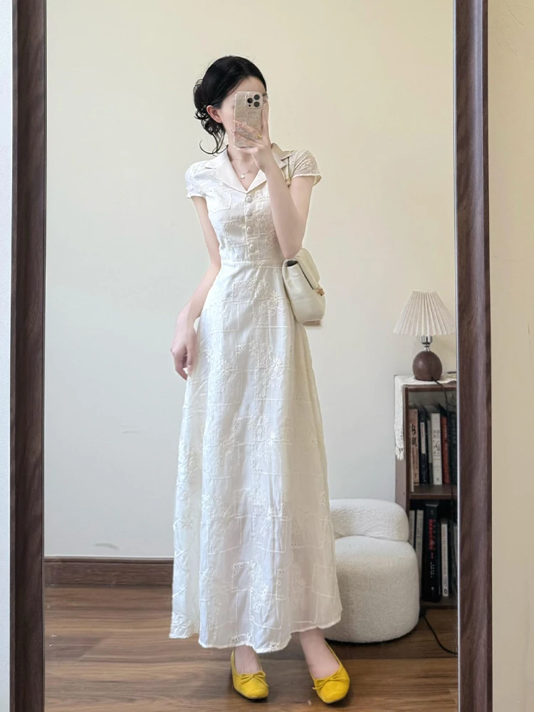 今年超火白色刺绣连衣裙女2025夏季度假风法式小众掐腰气质长裙子