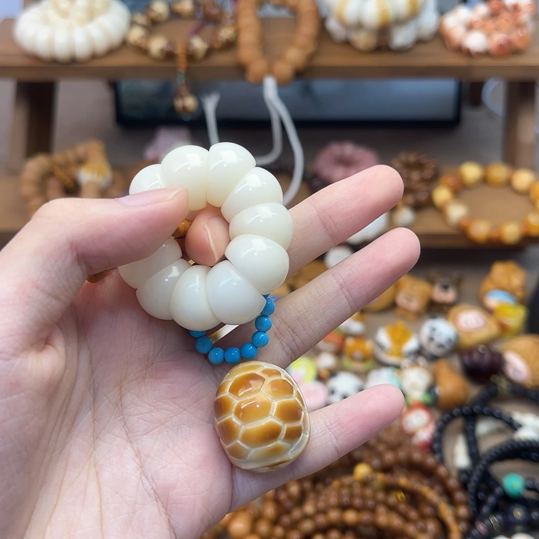 菩提根/象牙果手串?**?手捻富甲