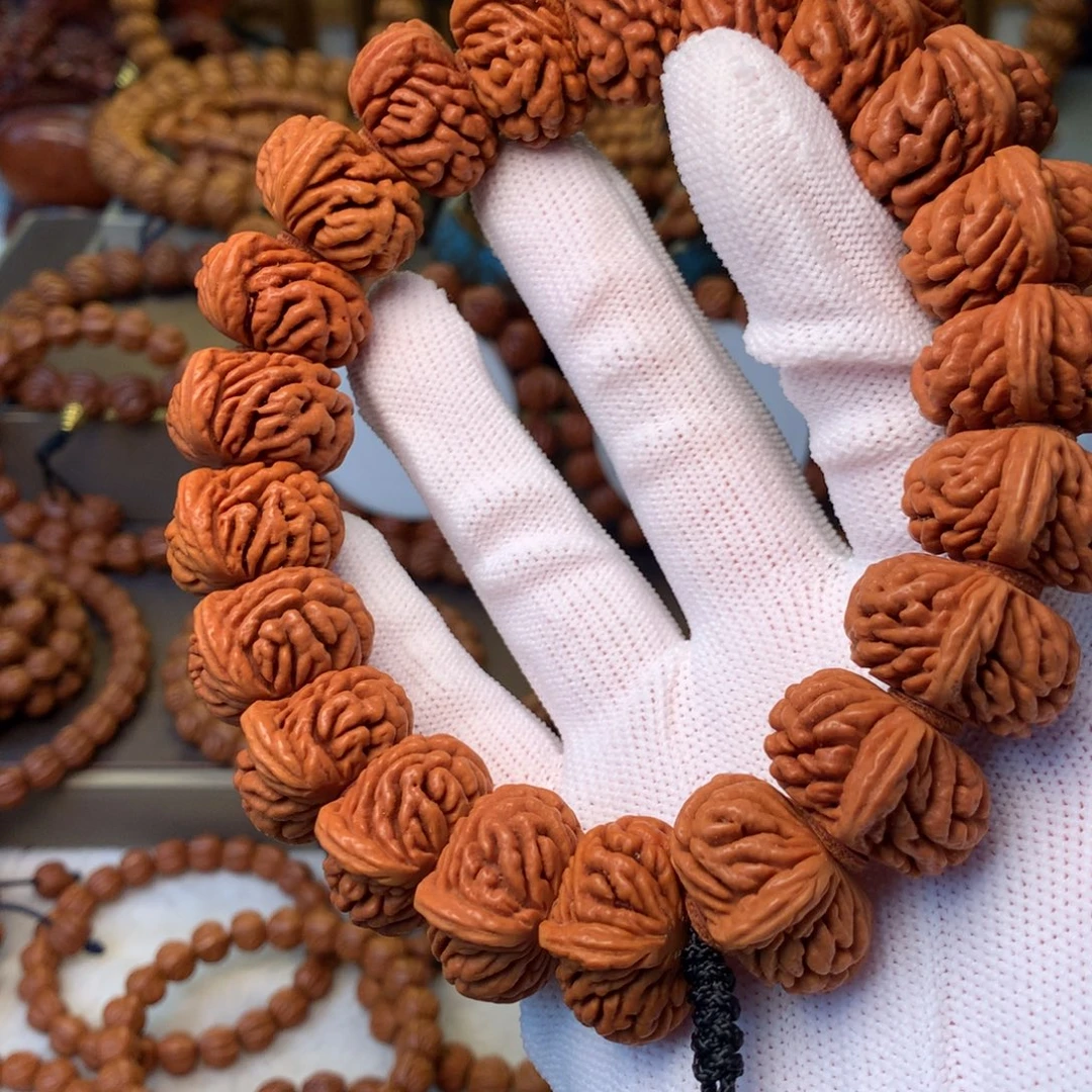 Y***A桃核手串秦岭龙纹