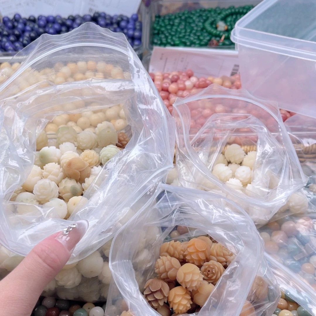 白玉菩提吊坠q16-18mm12颗。大连花三拼