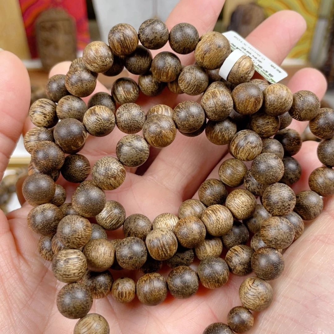 沉香手串庄*人菩萨棋树心老料0.9×108