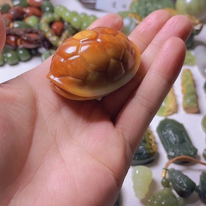 和田玉手把件未镶嵌九*