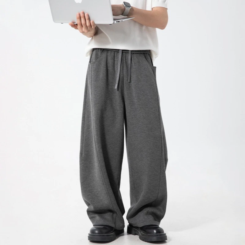 分割拼接质感休闲裤男春夏新款廓形弯刀长裤垂感宽松美式运动卫裤