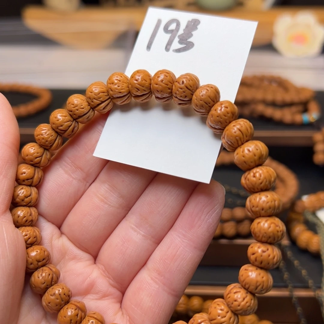 盘***子文玩核桃把件秦岭龙纹桃核11蟠桃手持