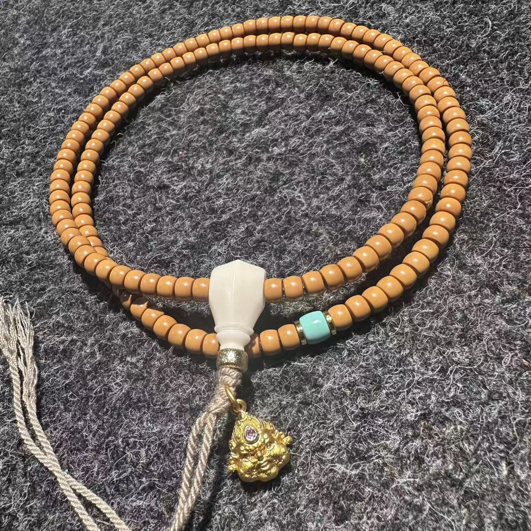 5.1精品清水核尖长串脖挂