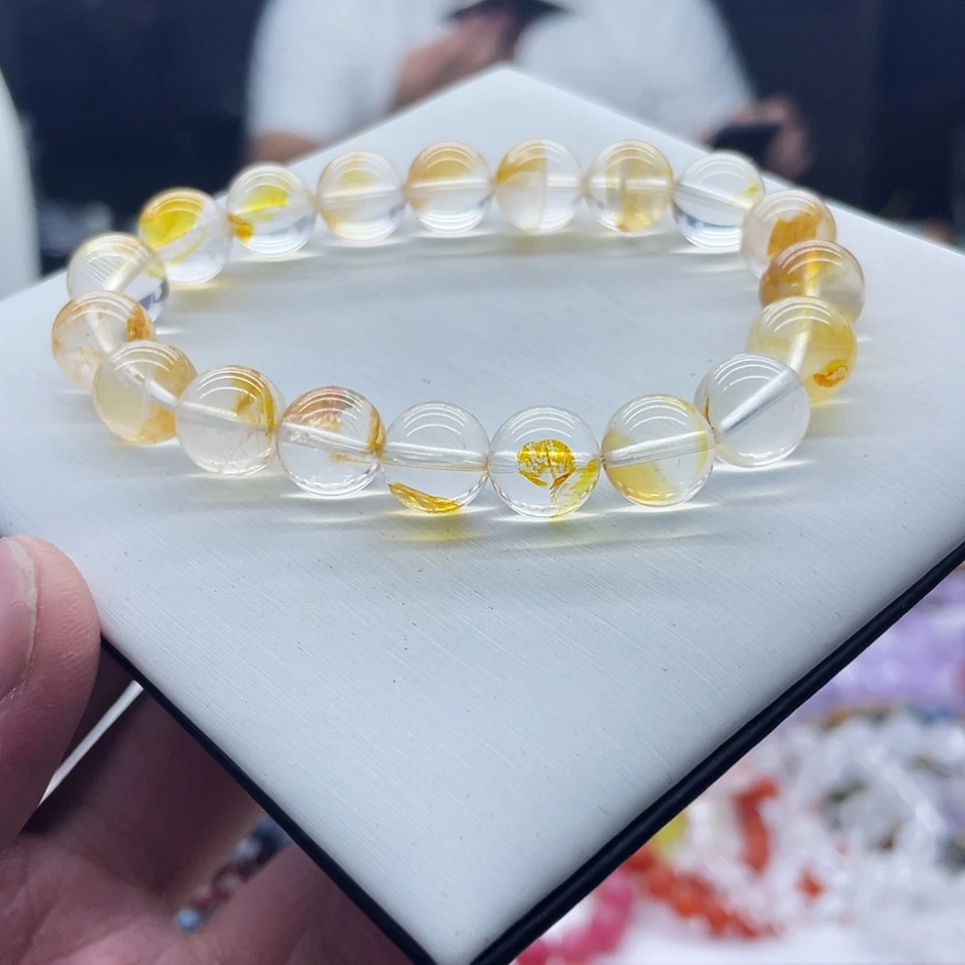 韦***）水晶未镶嵌手串黄浇花手串