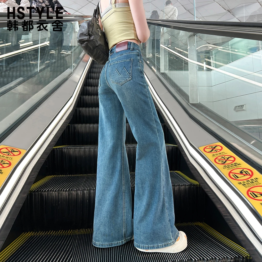 韩都衣舍深蓝色微喇叭牛仔裤女2025秋装新款窄版拖地牛仔喇叭裤子