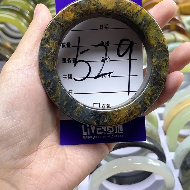 蛇纹石玉手镯合金卢****情