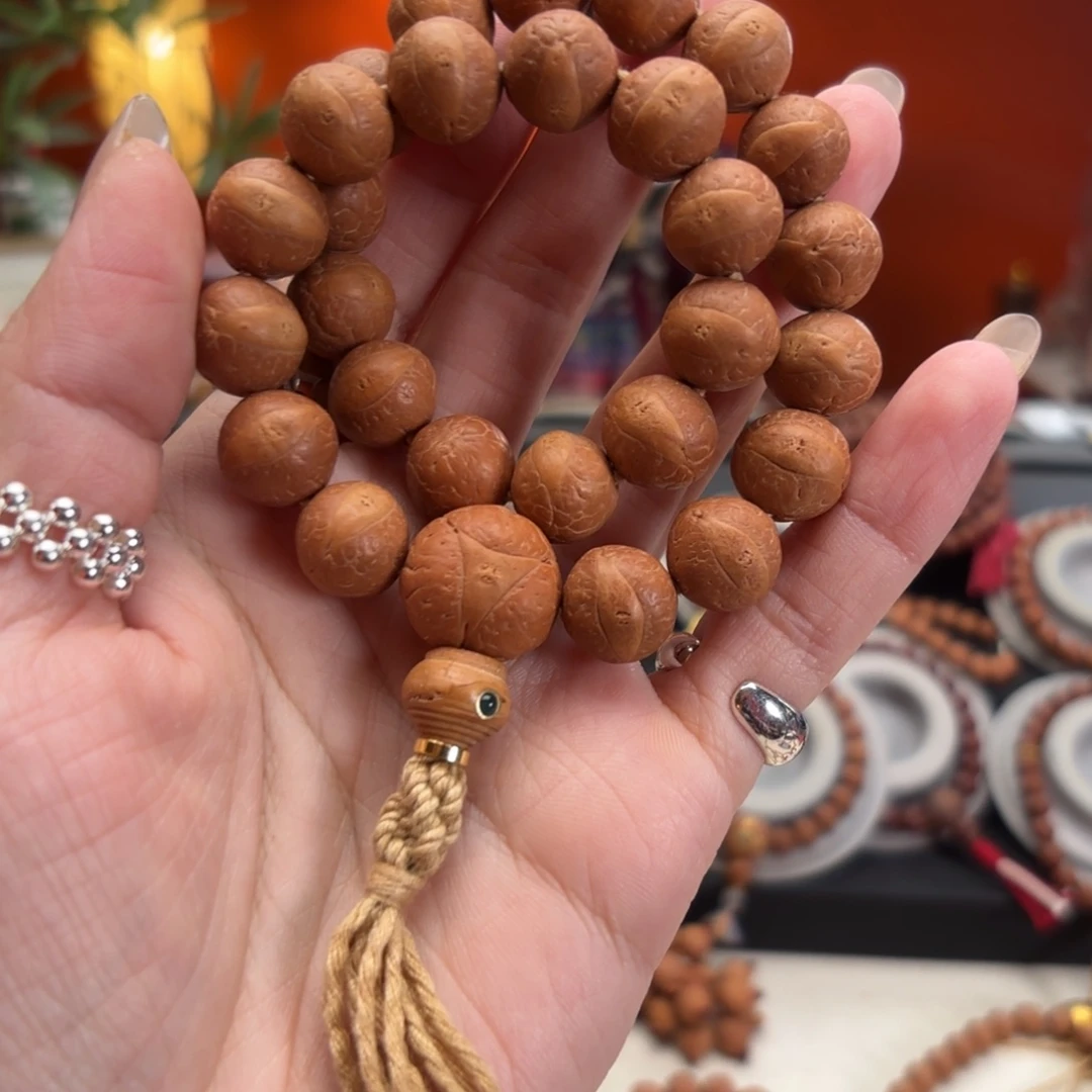 凤眼菩提吊坠13毫米手持