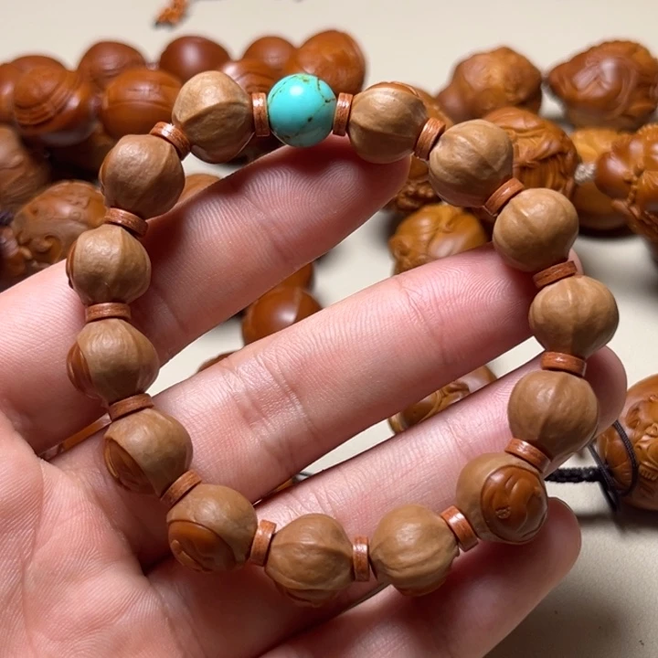 江***生手串橄榄核无相佛