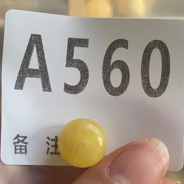 琥珀未镶嵌裸石微瑕小坑12.7