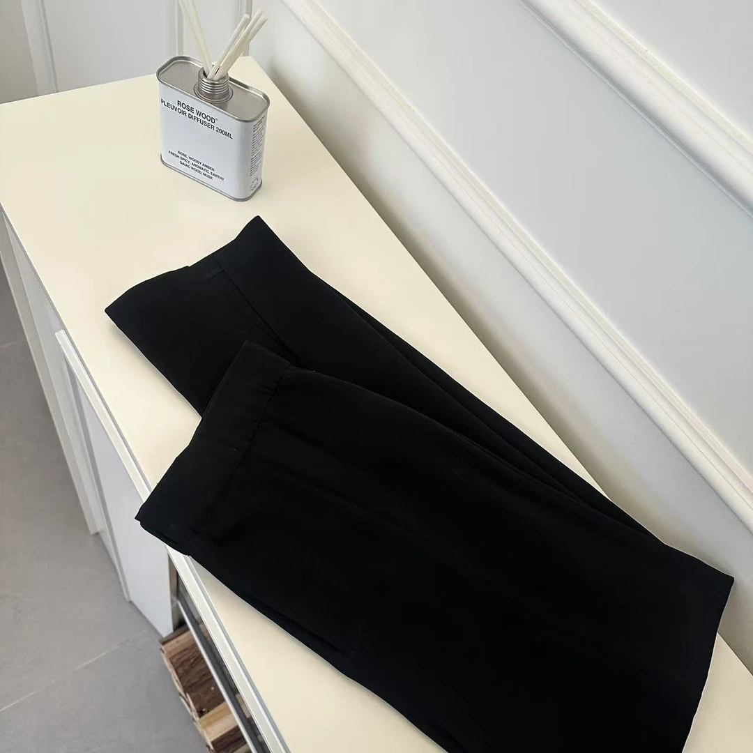 ZK5123   【ZM】 弹力腰春夏显瘦下摆开叉醋酸裤