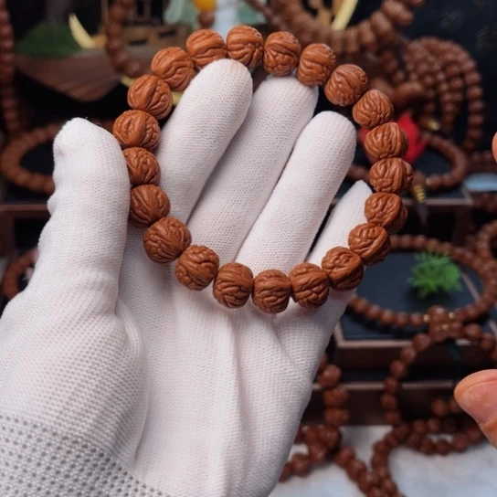 吊坠桃核长****万13双脊龙手串