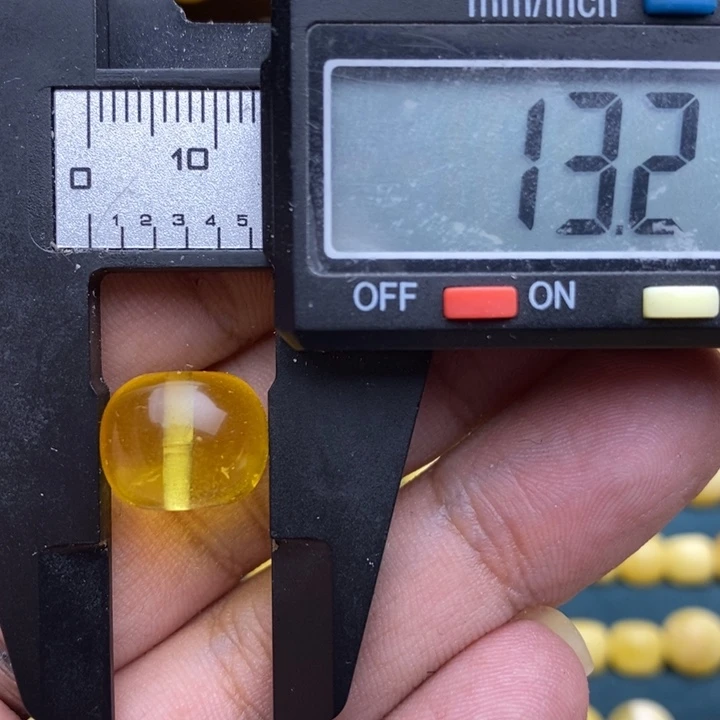 琥珀未镶嵌裸石58号13.2*10.7喇叭口微瑕