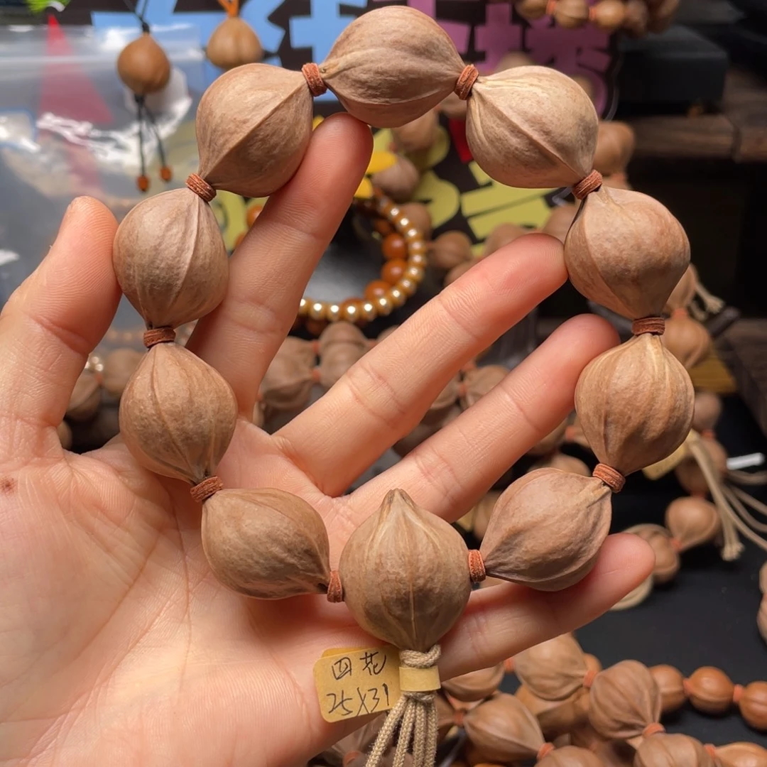 扣****吊坠橄榄核2531四花铁核