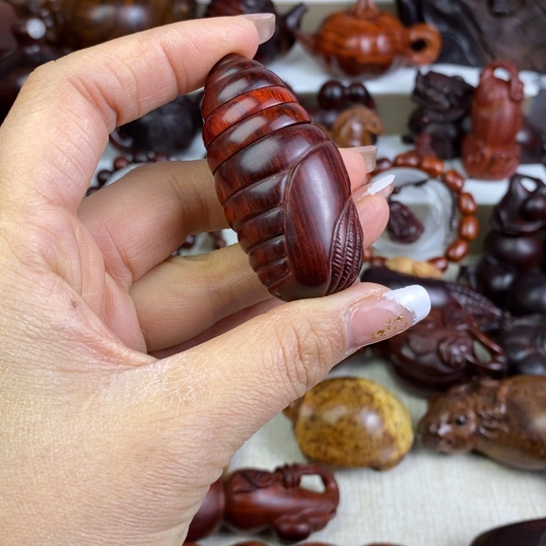 木段光紫檀手把件