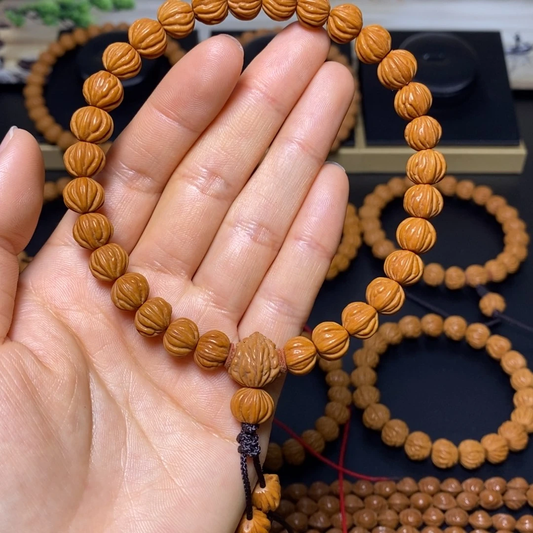 刘***琦手串桃核秦岭文玩桃核手持