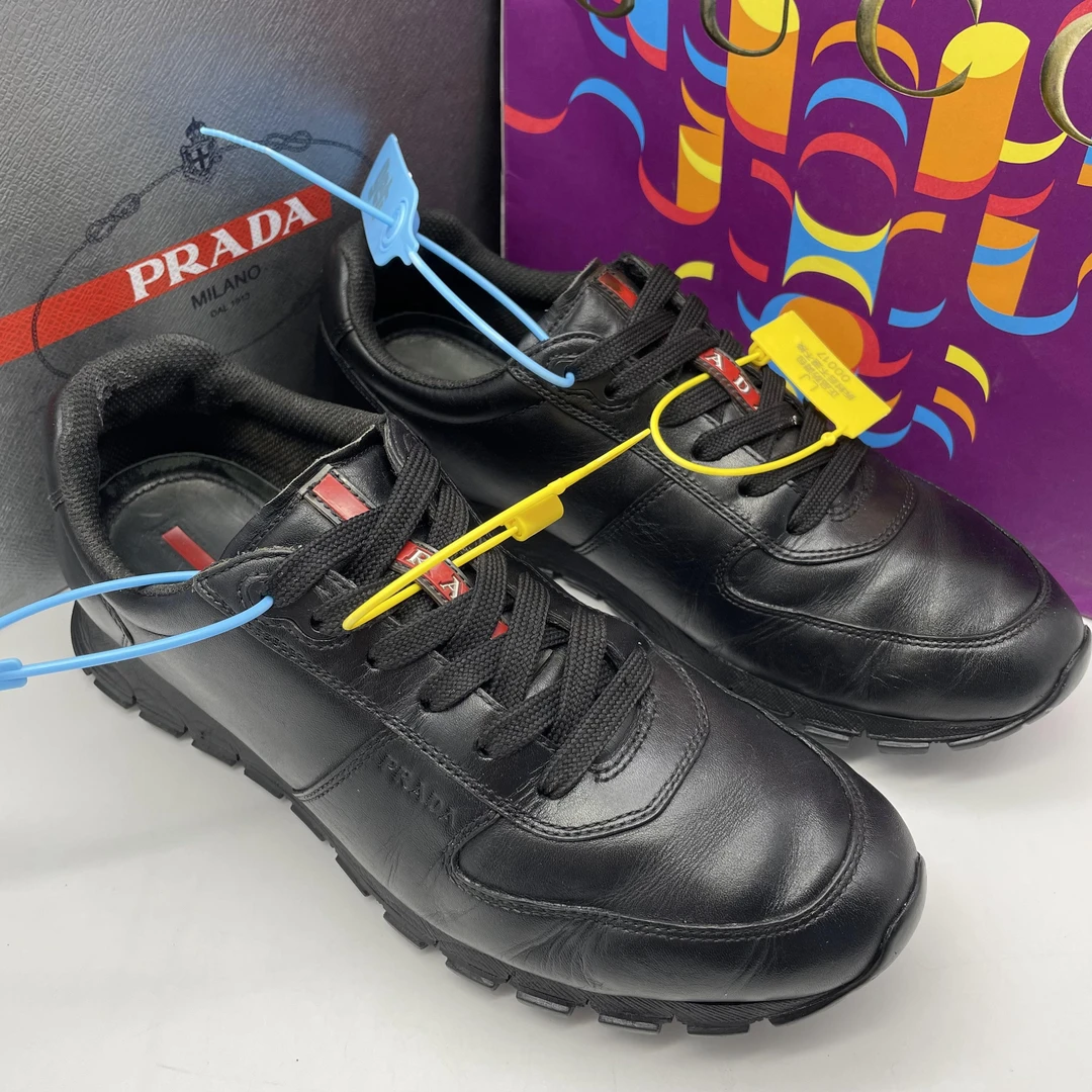 95新 Prada/普拉达 40.5/黑色通体皮革面料休闲运动鞋