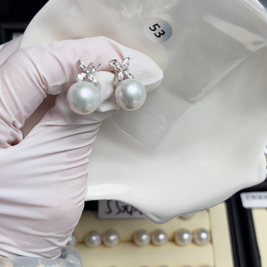 醒****银S925镶嵌淡水珍珠耳饰