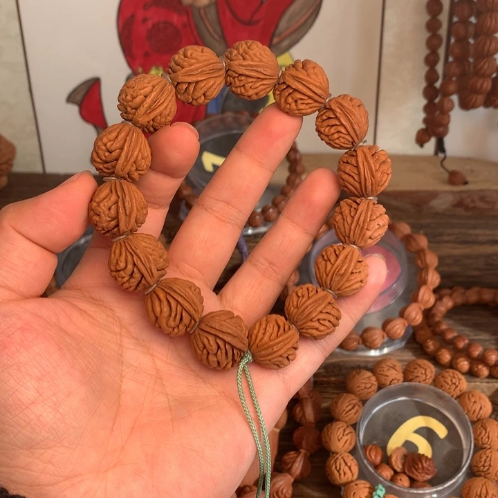 桃核吊坠20刺龙编织